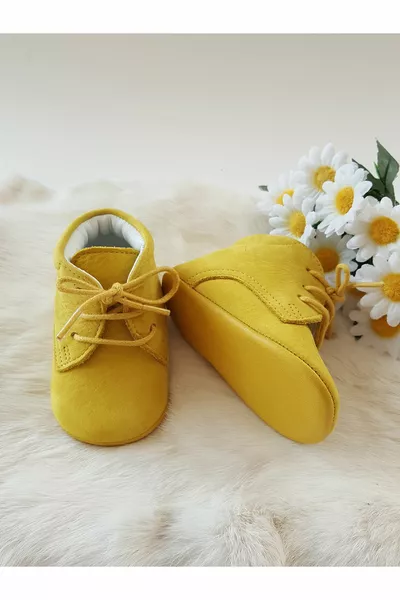 أحذية أطفال جلدية أصلية صفراء