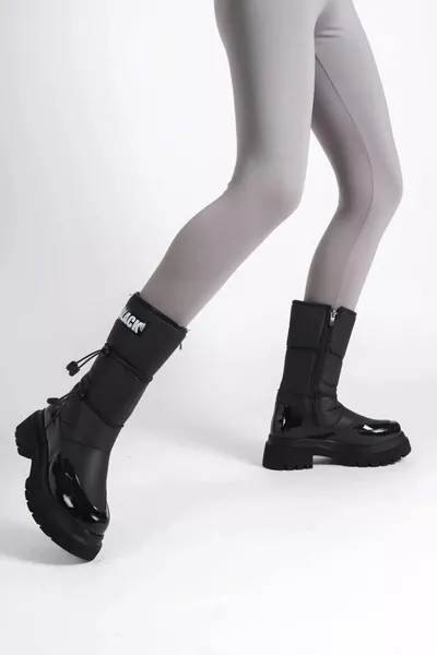 ماء عدم الانزلاق الوحيد الأسود المظلة النسيج أحذية الثلج النسائية المرنة