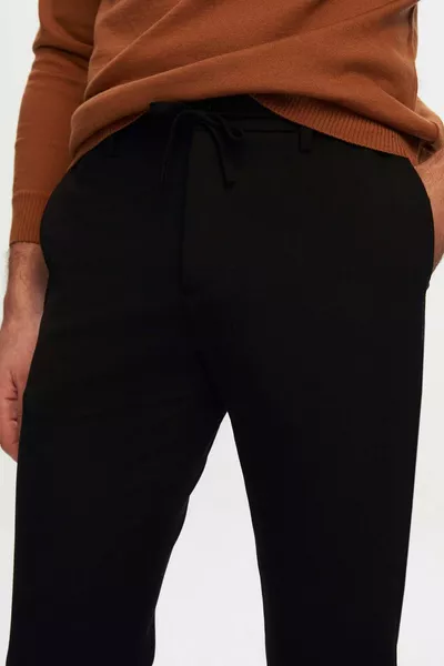 سليم صالح أسود مطاط الخصر الدانتيل المتابعة بسحاب ليكرا عارضة بنطلون رياضي