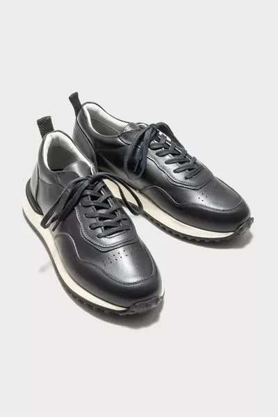 حذاء رياضي رجالي جلد أسود