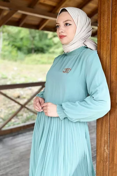 Abito da sera in chiffon plissettato menta