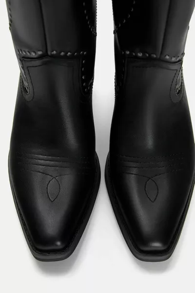 أحذية رعاة البقر تدبيس