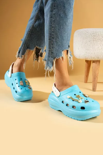 المرأة الزرقاء إيفا البحر الشاطئ كوك طبيب ممرضة مستشفى كونفورت عارضة الصنادل النعال