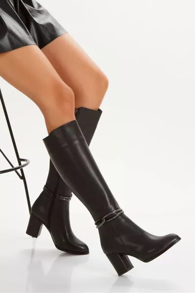 المرأة الحجر السائل مصبوب أحذية طويلة