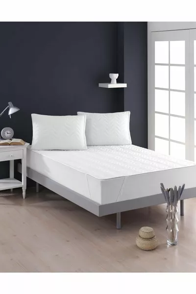 Капитонирана бяла протекторна калъфка за легло, подходяща за единични и двойни легла, водоустойчива и не предизвиква потене