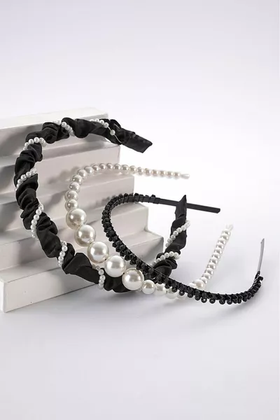 طقم تيجان أسود مزين بالكريستال واللؤلؤ