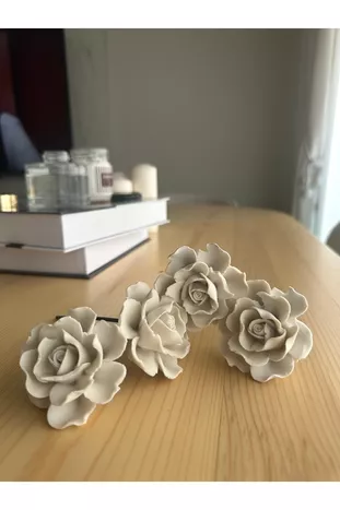 Set van 4 bloemensteenhouders van natuurlijk bamboestokje met extra geur