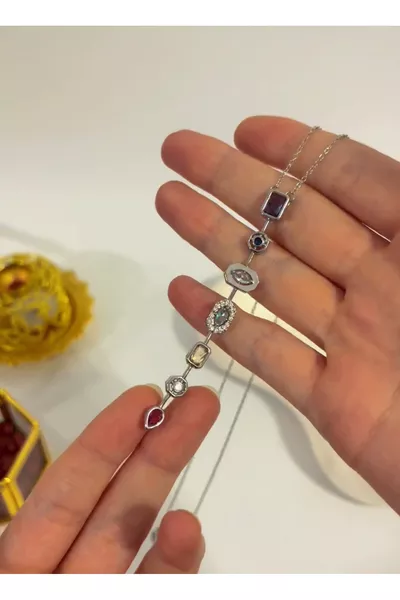 قلادة على شكل Y بحجر بلون فضي