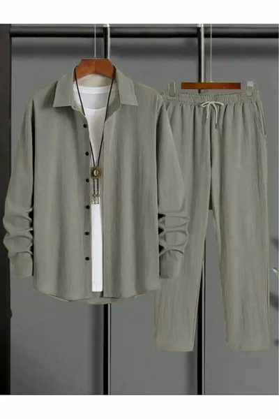 قميص رجالي بأكمام طويلة باللون الأخضر الفاتح مع سروال بدلة رياضية من القماش المجعّد