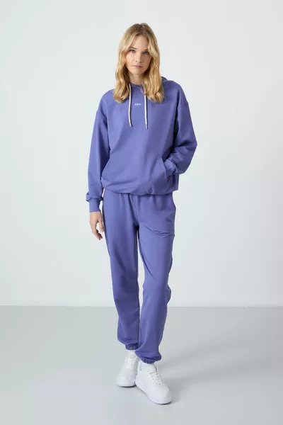 Женский спортивный костюм с капюшоном и карманом кенгуру, свободного кроя, с эластичными манжетами - 