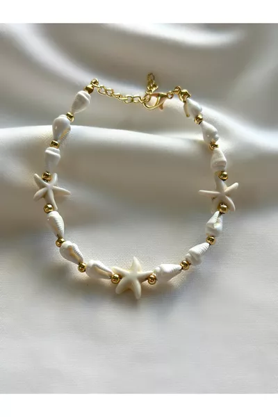 Гривна с морска черупка и звездички