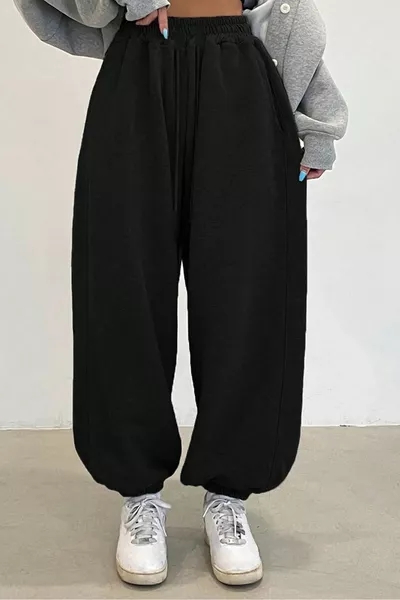 بنطال رياضي نسائي فضفاض من قطعتين باللون الأسود