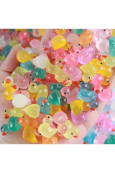 Набор из  мини-фигурок уточек, светящихся в темноте