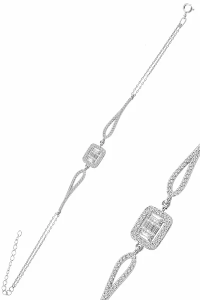 Zilveren armband met roodium en zirconia baguette stenen. rodaj