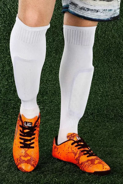 كوبرا إتش إم أستروتيرف – حذاء رياضي رياضي للرجال برتقالي – أسود