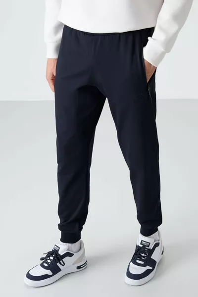 بنطال رياضي للجنس الذكور بتصميم عادي وجيوب بسوستة باللون الأزرق الداكن - 