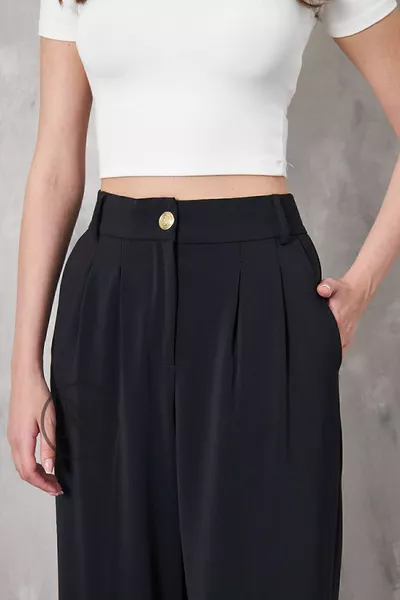 PANTALON PALAZZO PLISSÉ À BOUTONS DORÉS