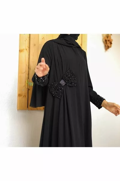 فساتين السهرة تفاصيل القوس