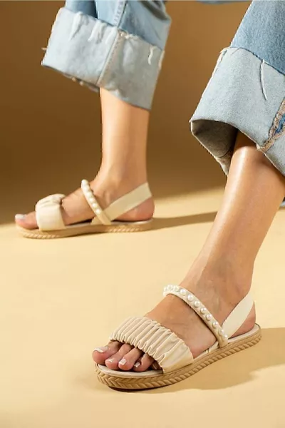 Drawstring sandals with beige pearl stones