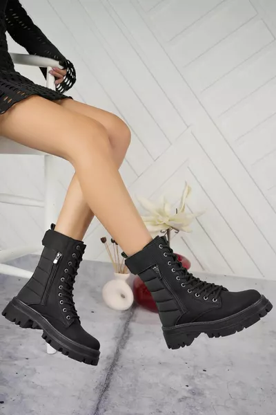 أحذية ثلجية سوداء مقاومة للماء للمرأة