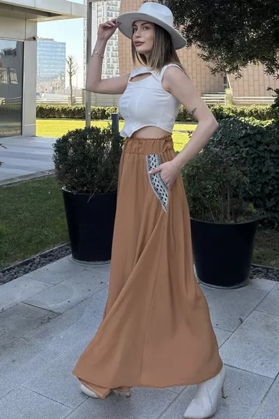 Dames tan taille elastisch, rieten geborduurde zakken, comfortabele snit, lange gewicht rok