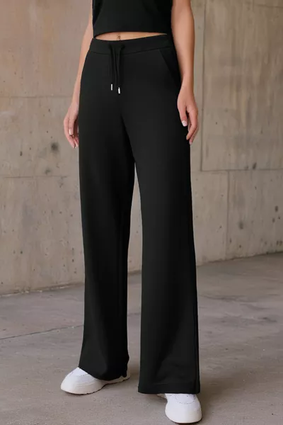 Pantaloni da donna in cotone, vita alta, neri, modello flare, gamba larga, con coulisse, tasche, elasticizzati e morbidi in lycra