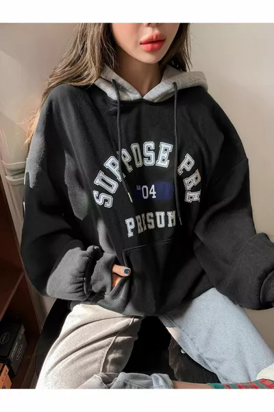 سويت شيرت واسع أسود بطباعة Suppose بثلاث طبقات للنساء