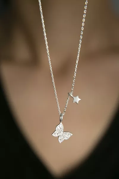 Women's Butterfly Design Silver Necklace with Star Detail