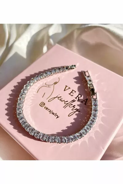 Стальной браслет с квадратными камнями в дорожке из стали