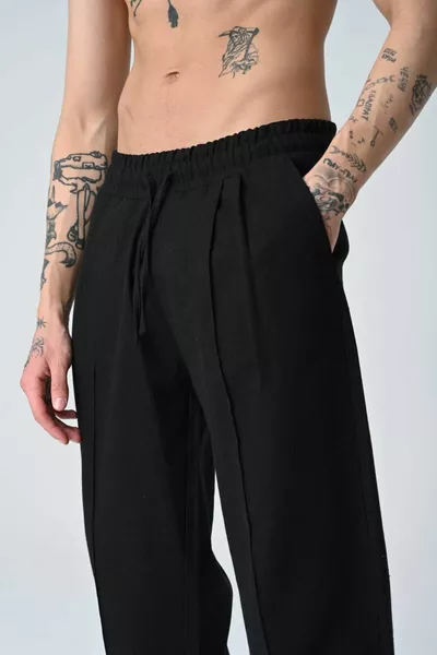 Черные мешковатые брюки из плиссированного льна