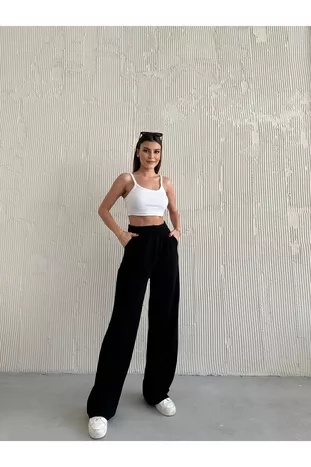 Dames zwarte hoge taille plissé palazzo broek met lycra