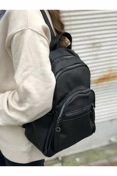 حقيبة ظهر جلدية سوداء نسائية مصقولة