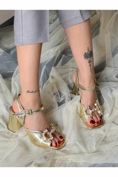 ARYA SANDALI CON TACCO TRASPARENTE GOLD STONE