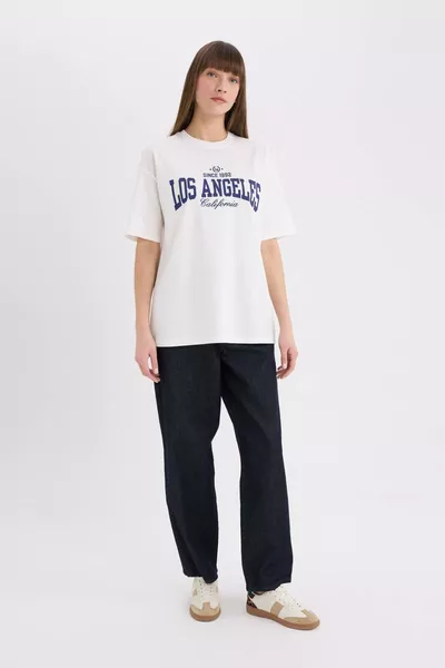 T-shirt à manches courtes oversize à col rond avec imprimé SP