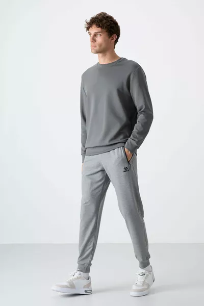 Pantaloni da Jogging Uomo con Zip e Tasche Grigio Mèlange Taglio Standard - 