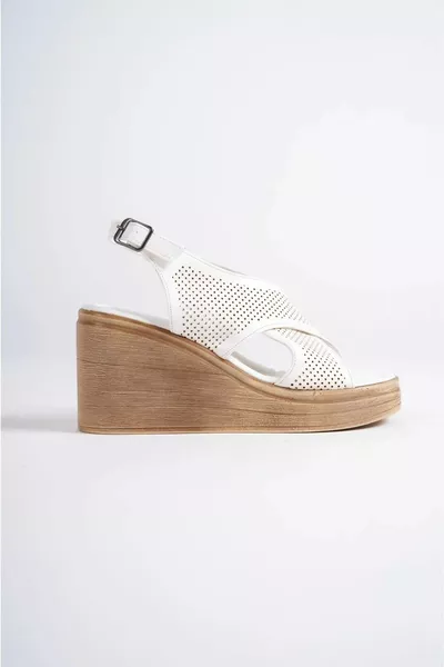 Tacchi imbottiti comodi con cinturino incrociato da donna con solette forate