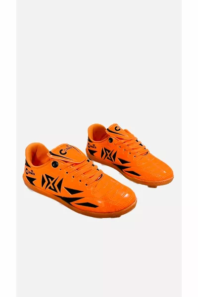 Fußballschuhe für Jungen Kunstrasen mit Nietenabsätzen