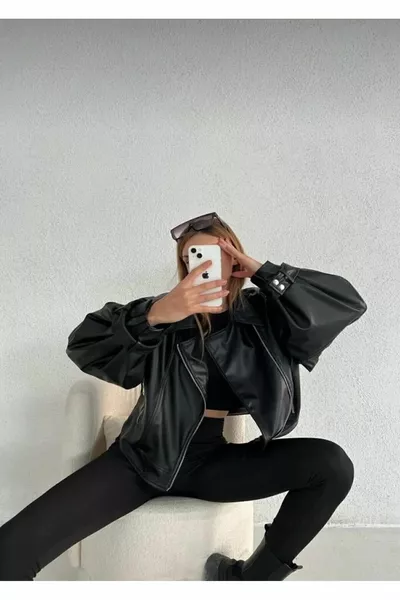 Blouson en cuir noir à manches ballon