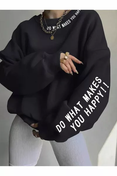سويت شيرت فضفاض بياقة دائرية للنساء بطبعة 'Do What Makes' باللون الأسود