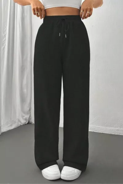 Pantaloni da tuta da donna neri, ampi e comodi, stagionali, con tasche laterali