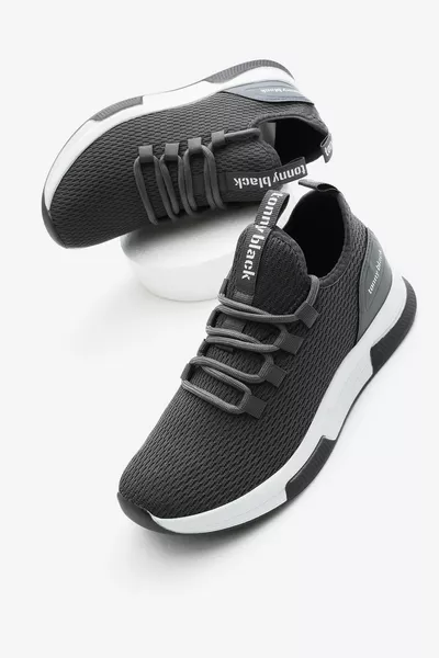 حذاء رياضي للجنسين من قماش قابل للتنفس باللون الرمادي الداكن مع نعل بولي ورباط