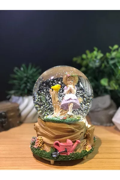 Любимо момиче и птица с музикални и светлинни ефекти голяма снежна топка, която пръска сама