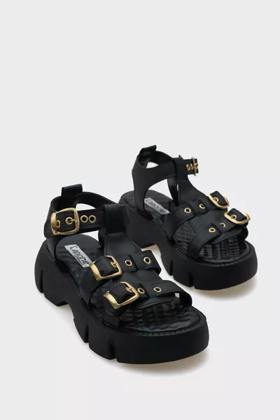 صندل نسائي بقاعدة سميكة وحزام عند الكاحل من شيري