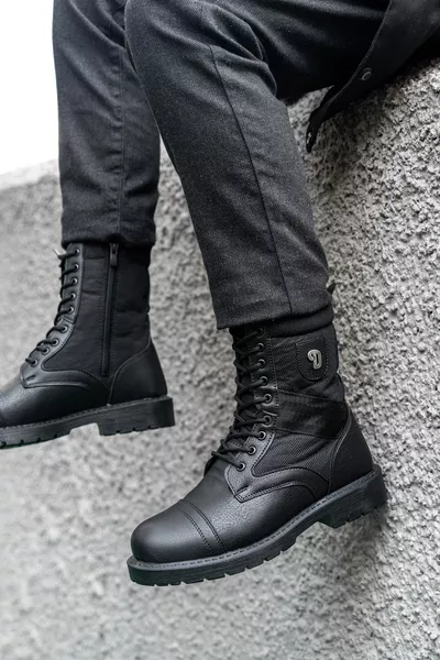 حذاء رجالي شتوي أسود مقاوم للماء والبرودة بسحّاب ونعال مطاطية مانعة للانزلاق مضمون