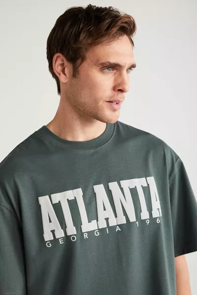 ATLANTA Herren Kurzarm-T-Shirt mit detailliertem grünem Print aus  % Baumwolle