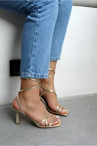 Talons pour femmes à rayures dorées Santa