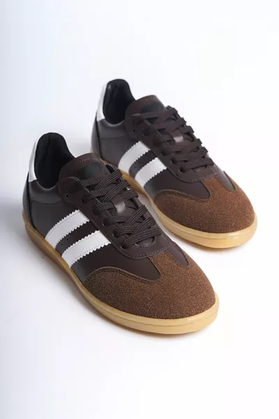 مضمونة  أحذية رياضية نسائية غير رسمية لتقويم العظام