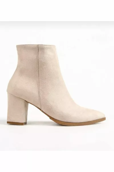 Bottes à talons pointus beige beige crème en daim à bout pointu