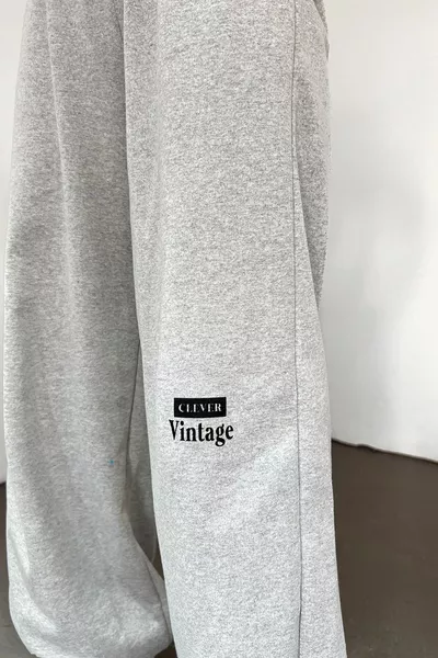 بنطال رياضي واسع للنساء بلون رمادي، بحبل مرن عند الخصر وقصة أرجل واسعة