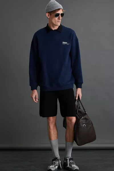 إرنست سويتشيرت أزرق داكن قطن عضوي بحشوة ناعمة للرجال مع تفاصيل مطبوعة ومقاس واسع